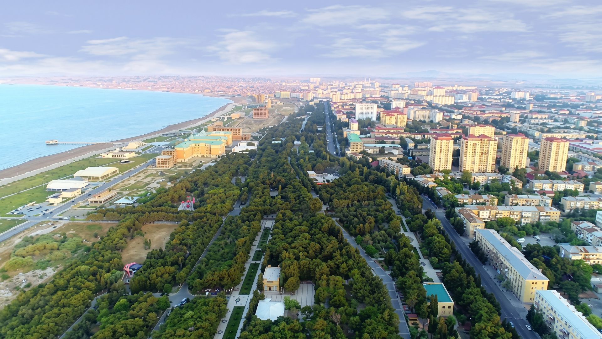 Aerial panorama of Sumqayit, its Caspian waterfront, boulevard and green parks
