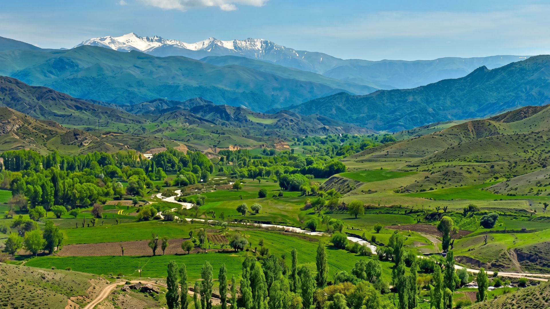 Green valley, river and snowy mountain scenery supplied for the Tovuz article