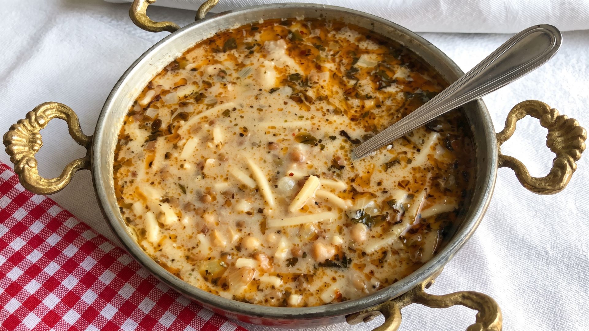 Soup with herbs and pieces of dough